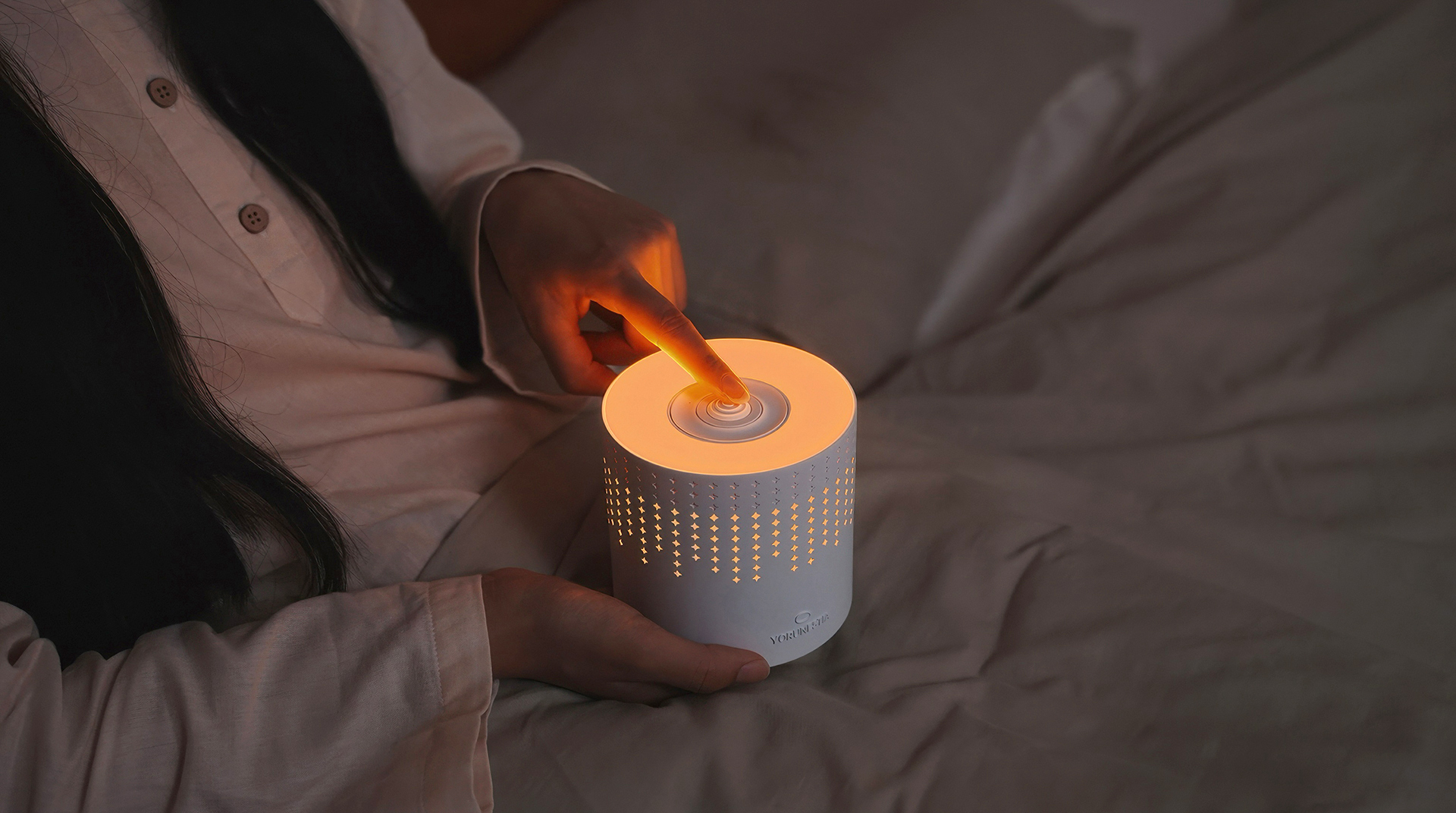 YORUNESTIA in bedside night scene
